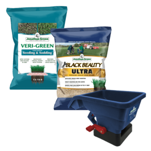 Two bags of Jonathan Green Veri-Green grass seed and Black Beauty Ultra grass seed and a blue broadcast spreader comprise a Small Lawn Starter Kit on a white background.