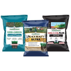 Three bags of Jonathan Green lawn care products: Veri-Green, Black Beauty Ultra, and Mag-I-Cal Plus Grass Seed & Fertilizer Bundle for Acidic Soil, displayed against a transparent background.