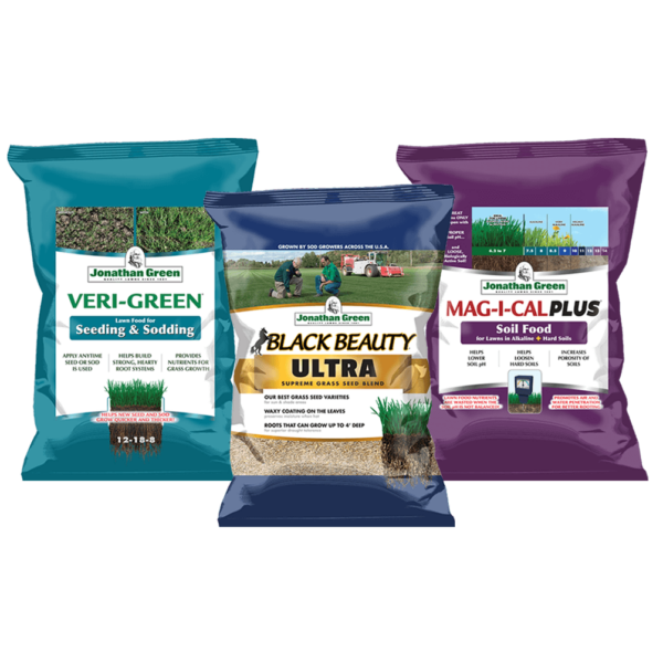 Three bags of Grass Seed & Fertilizer Bundle for Alkaline Soil: Seeding & Sodding, Black Beauty Ultra Grass Seed, and Mag-I-Cal Plus Soil Food for alkaline soil, arranged upright.