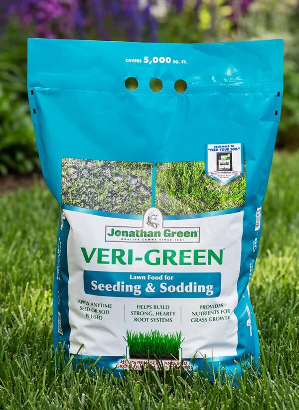 A bag of Grass Seed & Fertilizer Bundle for Acidic Soil placed on grass, covering 5,000 sq. ft., with details for seeding and sodding.