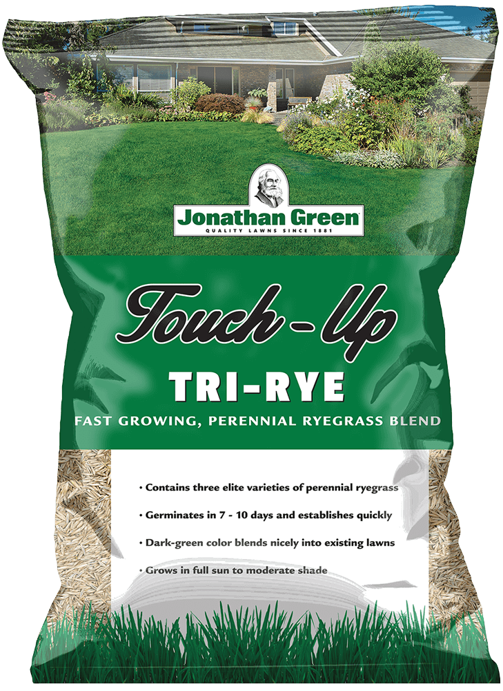 Bag of jonathan green touch-up tri-rye grass seed in front of a well-maintained lawn.