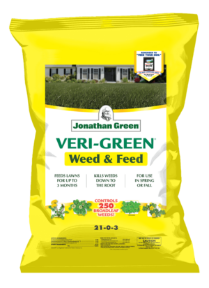 A bag of Jonathan Green Annual Lawn Care Program for Acidic Soil, part of the Jonathan Green Annual Lawn Care Program, with product information and a residential backdrop.